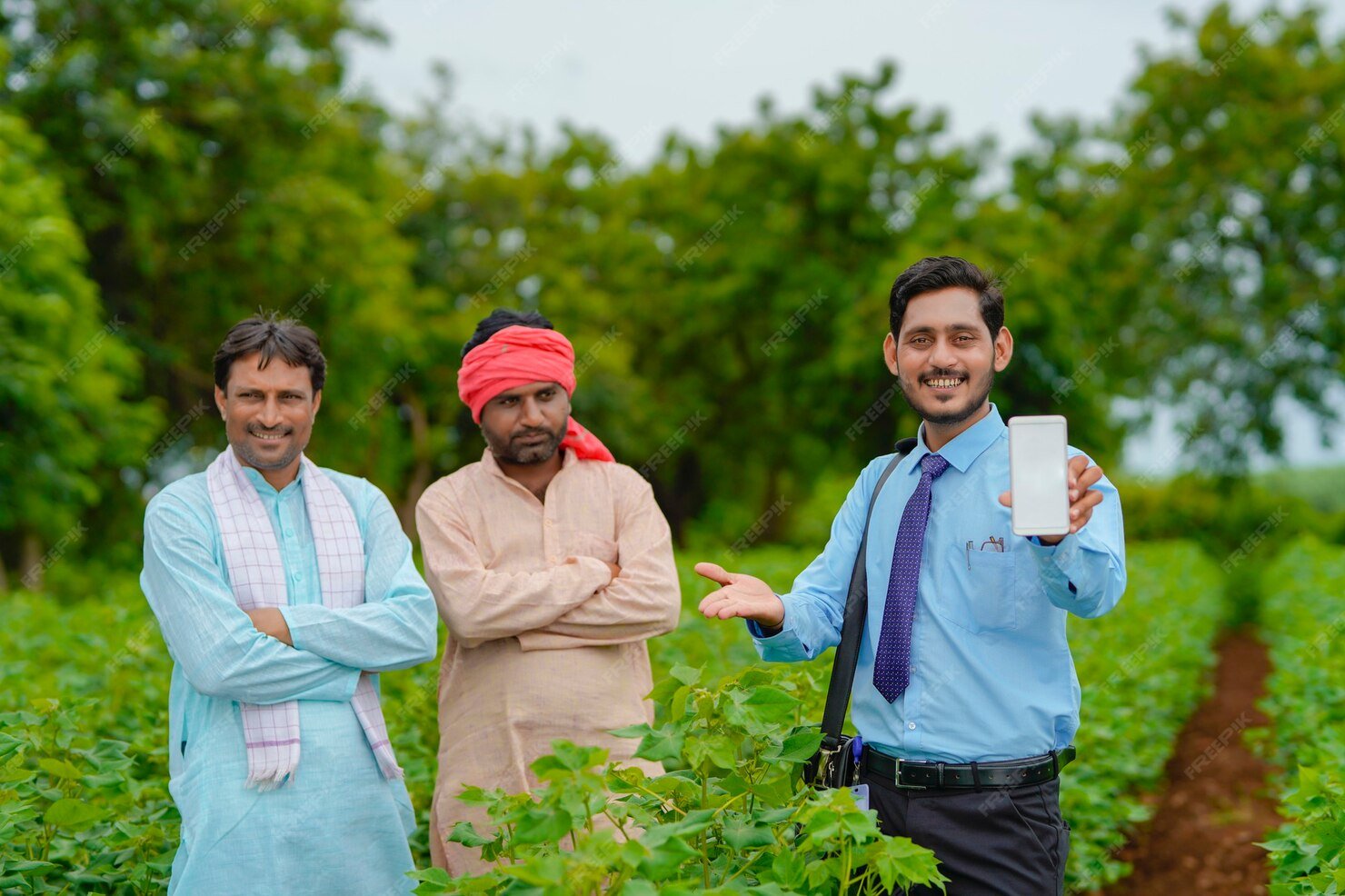 young indian agronomist banker showing tablet with farmers agriculture field_75648 7055
